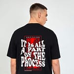 Black oversized T-shirt with bold 'Forever on the Guest List' graphic, red background, and streetwear design.